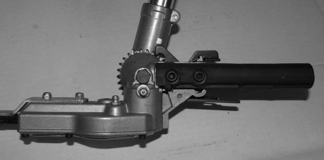 Using the hedge trimmer (extra equipment) Adjust the angle of the trimmer unit by activating the locking pin (1) and handle