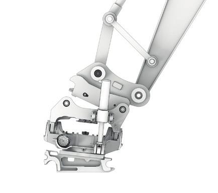 När tiltrotatorn är korrekt låst, lyft den något från marken för att avlasta eventuellt hydraultryck.
