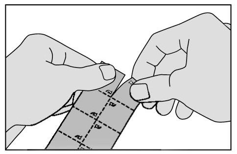 Riv av en ruta från blisterförpackningen längs