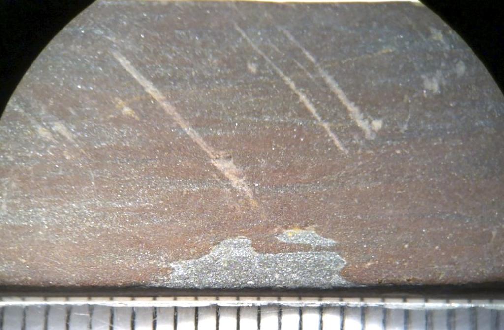 Kornen (mineralkristallerna) är i storleksordningen 0,1 mm. Figur 2.