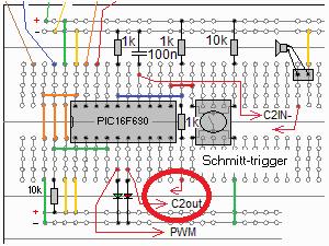 Koppla upp schmitt-triggern. Det gör Du genom att ansluta C2OUT till den fria ändan av 1kΩ motståndet ( från C2IN+ ingången ).