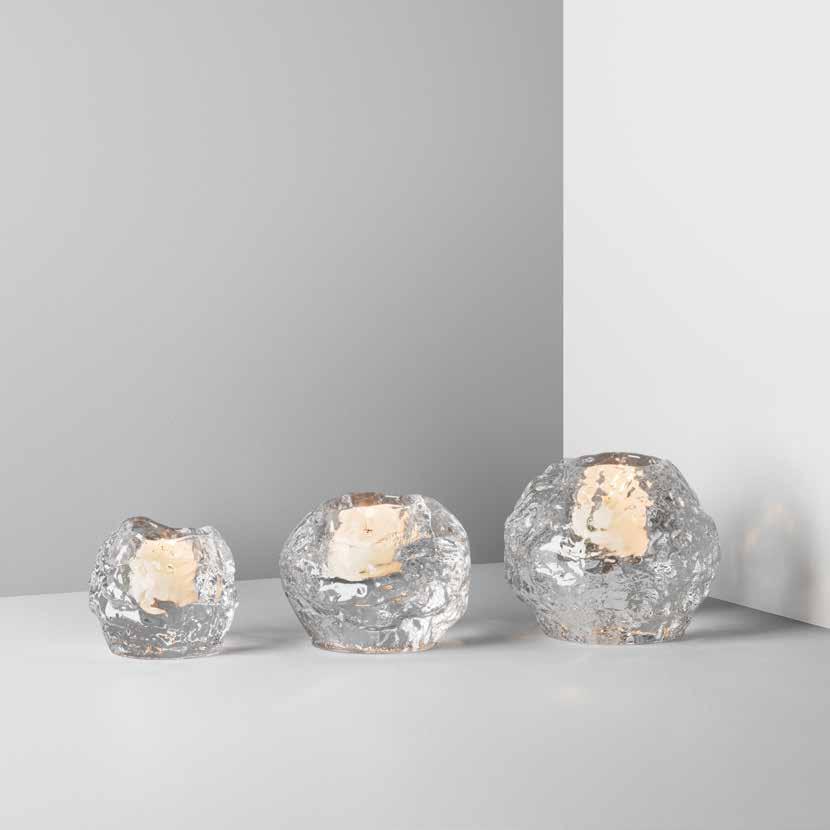 SNOWBALL Design Ann Wolff td. Wärff 1973 The Snowball the shape and crisp surface of the tealight holder evoke Swedish winters of old, when lanterns of snowballs lit up the winter darkness.