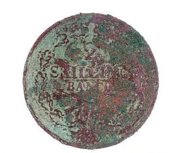 Det äldsta myntet var ett fragment av ett ¼ Öre, från Kristina Is regeringstid (figur 46). Bland mynten fanns även ett s k nödmynt med valören 1 Daler, präglad 1716 (figur 48).