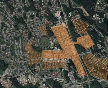 Ekholmens planform har beskrivits som ett klöverblad som delvis har planerats och kilats in i stadsdelarna runtomkring.