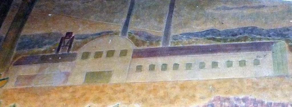 Den stora fabriken i fonden, Perstorps AB. Notera fabriksskorstenarna liksom byggnadens frontespis, byggnadselement som ofta kännetecknade dåtidens större industrier.