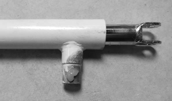 Lubricate all moving parts with grease before assembly.