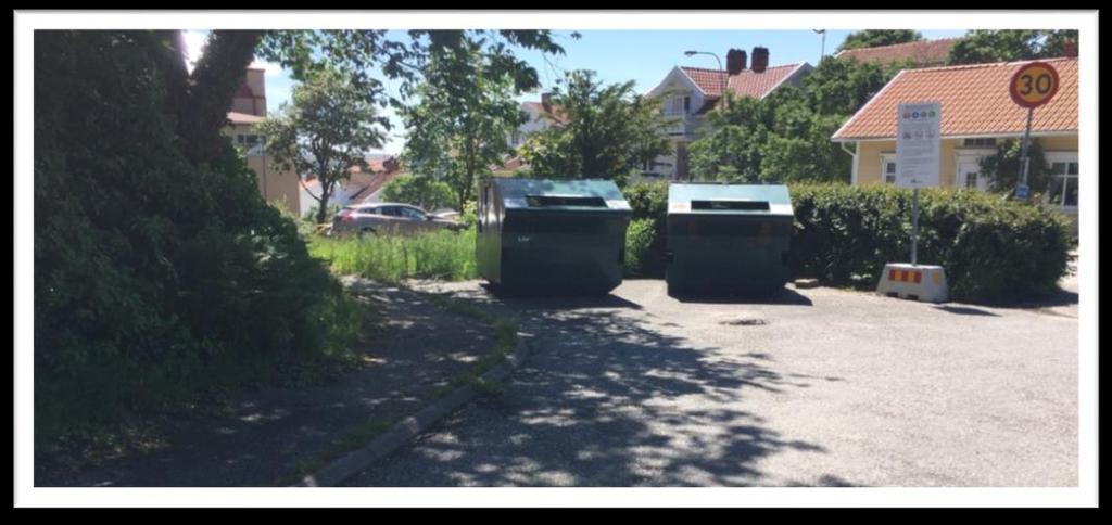 Utreda om återvinningscentralen kan ställas upp på en lämpligare plats i det absoluta närområdet. Kan den gräsbeklädda ytan bakom ovan synliga containrar användas?