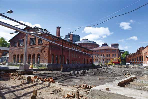 Bild 3 Bilder 3, 4 Vyer inifrån Gasverksområdet idag, dels med Gasklocka 4, dels med denna ersatt av 140 meters bostadstorn.