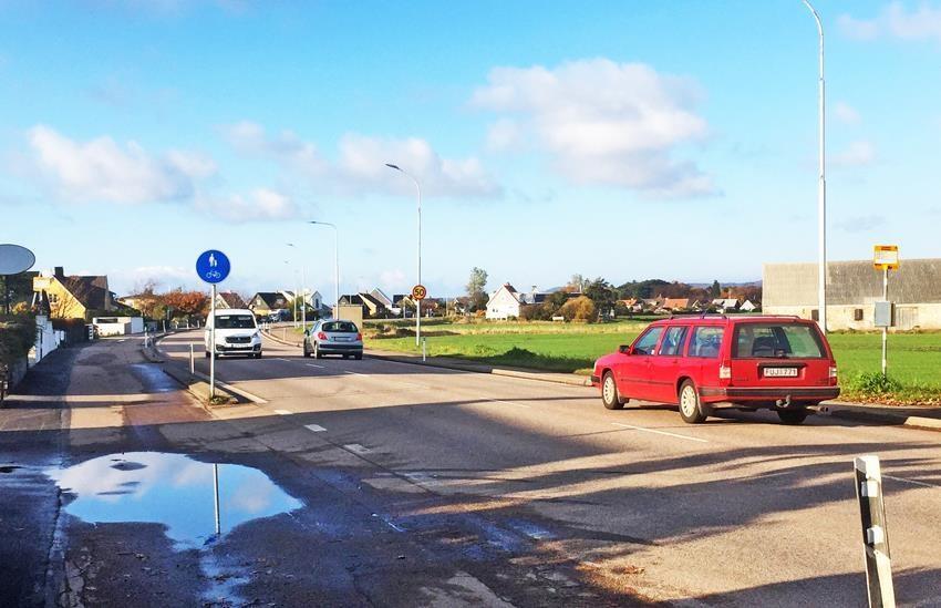 6. Mellbystrandsgatan Befintlig refug med trafikdelarmärke