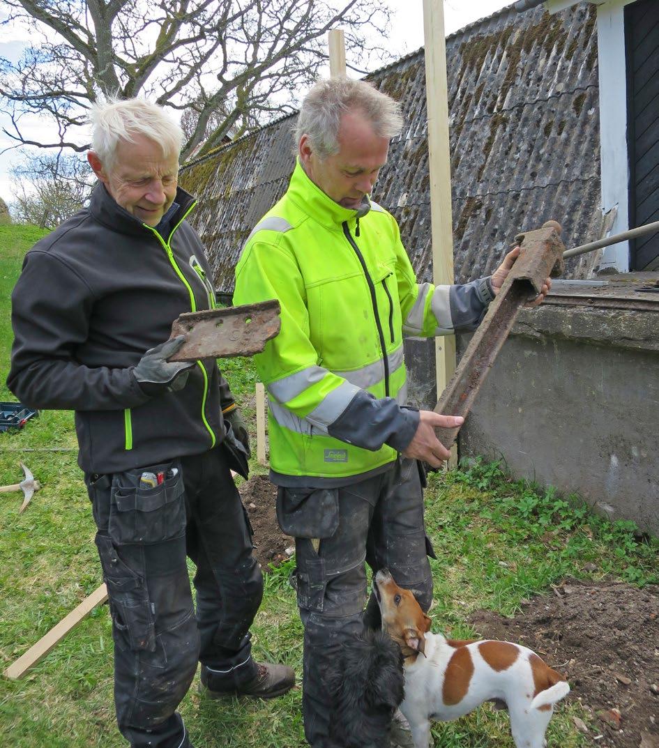 Upphittad grindstolpe