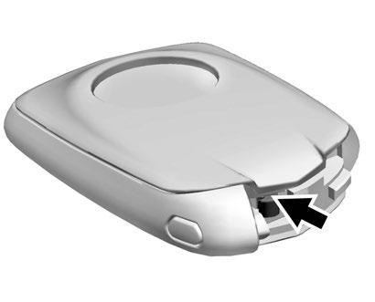 Nycklar, dörrar och fönster 33 2. Separera sändarens två halvor genom att föra in ett platt verktyg i mitten av nederdelen. Använd inte nyckelhålet. 3. Tag ur det gamla batteriet.