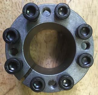 Remove the pulley shield to see and work on the pulleys and V-belts. 2.