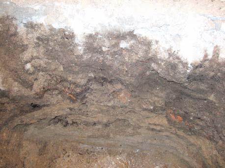Fastighet 6 Grop 2. Källarrum 1066B. 0,8 x 0,9 m stor, 0,8 m djup Gropen togs upp vid den norra väggen i källarrummet och hade grävts till ett djup av 0,55 m utan antikvarisk kontroll.