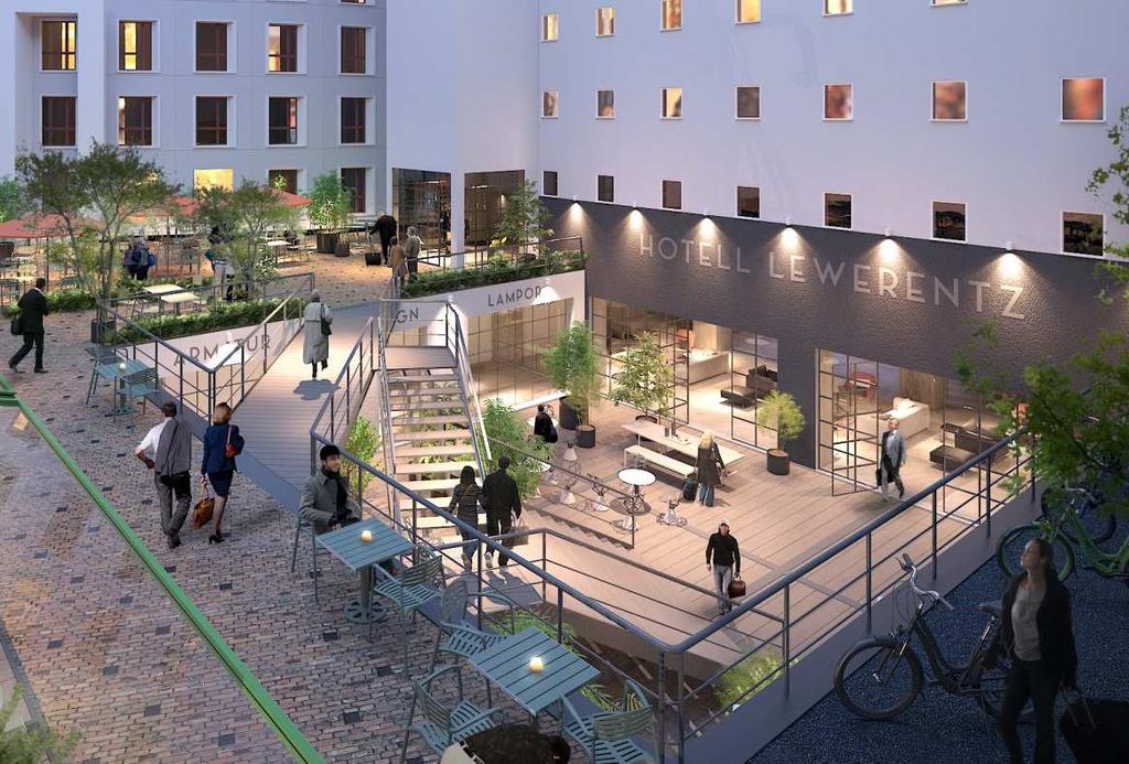 Hotellentré i hisstornet, uteservering på de bägge