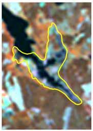 Exempel på ett våtmarksobjekt som betecknades som osäkert visas i figurerna 8-10. I våtmarkens östra del förefaller en väg gå in i våtmarken i nord-sydlig riktning (figur 8).