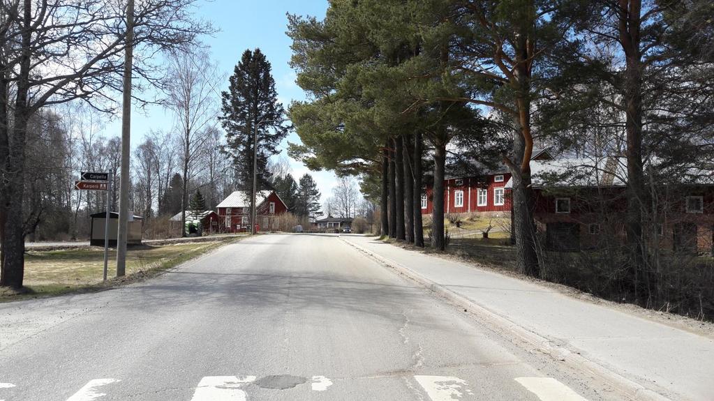 S i d a 4 Bild 6. Befintlig bebyggelse längs med Karperövägen, fotot taget söderut från infarten till Hultvägen.