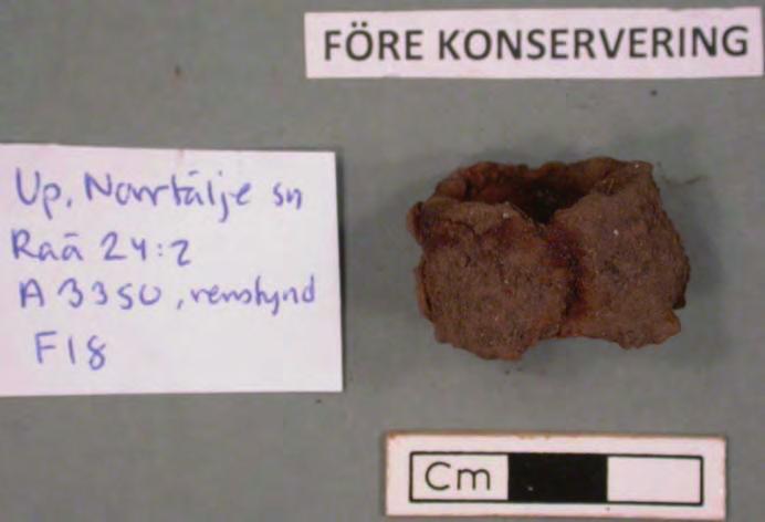 Bilaga 7. Konserveringsrapport Fnr. 18 Järnring Bred järnring.