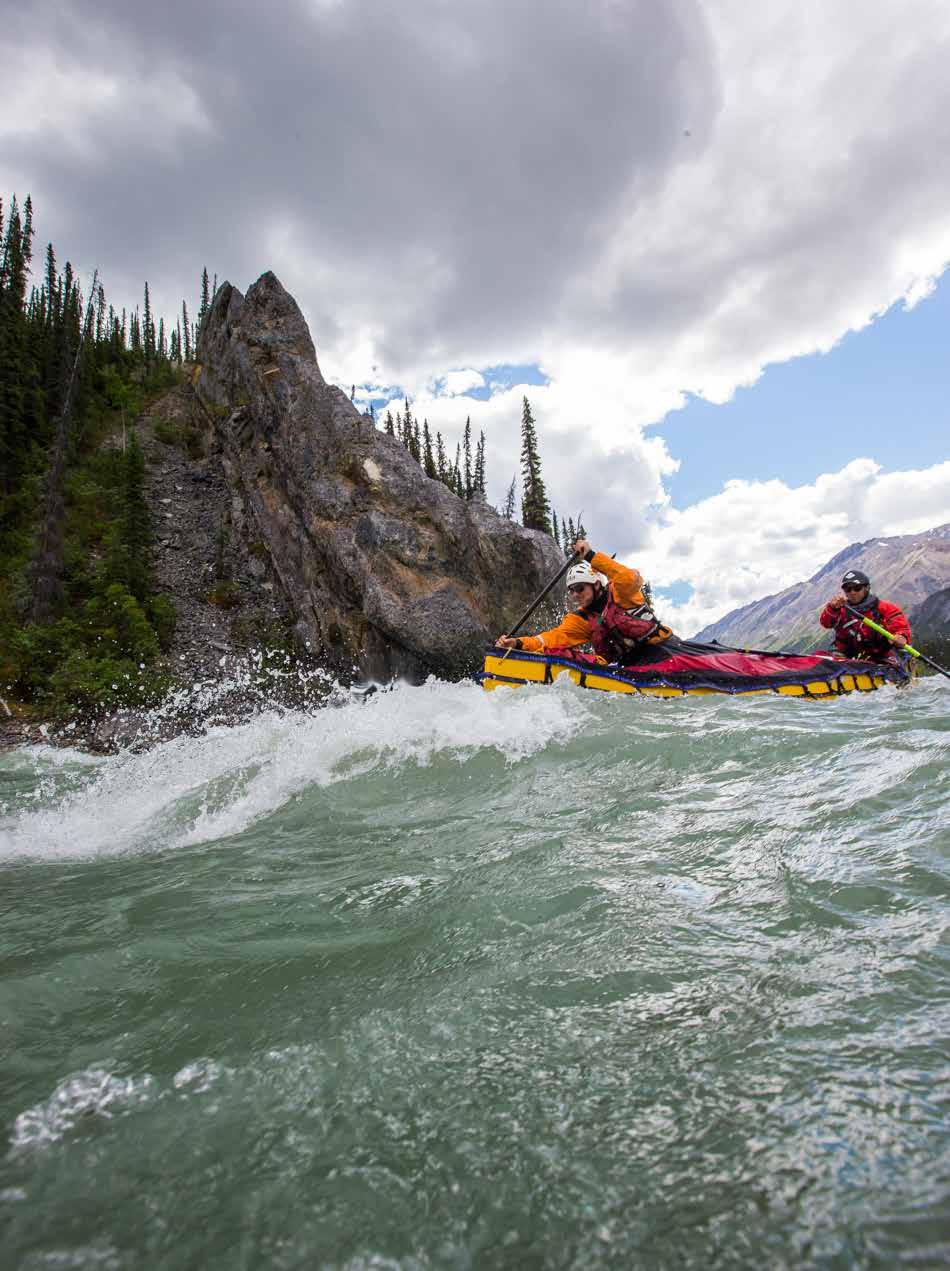 TIME TO PLAY Mini Gate to Grizzly Bear Creek 42-53 km The bouncy stuff just keeps going. If you like to play, keep your eyes peeled for surf waves. We found this one beside a small cave on river left.