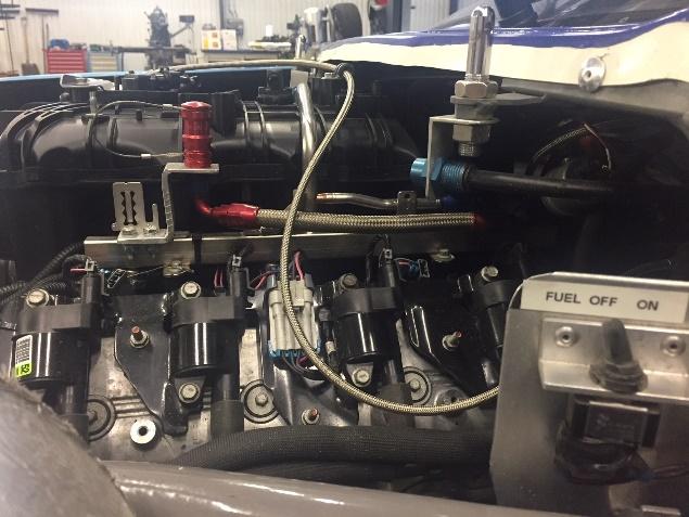 Vid slutförd urtankning återkopplas kabeln från ECM. Ur tanknings kopplingen måste placeras i motorutrymmet på Gen.6 modellerna enl. nedanstående foto: 10.