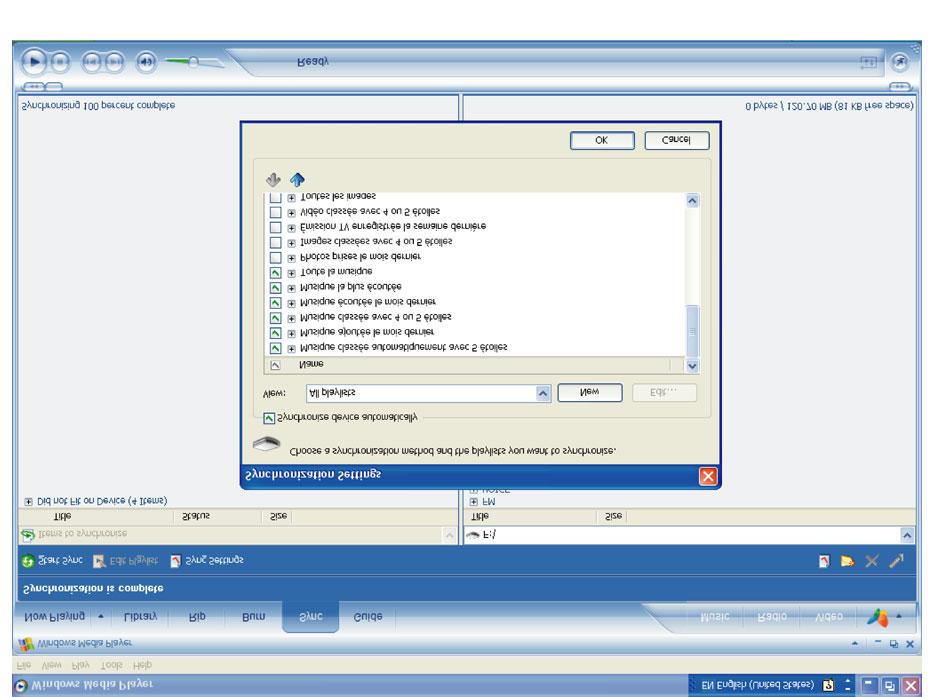 Einrichtung der automatischen Synchronisierung 1. Starten Sie den Windows Media Player. 2. Schließen Sie den Player an Ihren Computer via des enthaltenen USB Kabels an. 3.