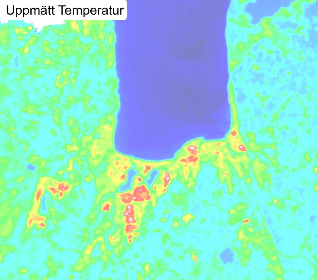 Kartan visare uppmätt temperatur. Röda och vita områden har högst temperatur och blå lägst.