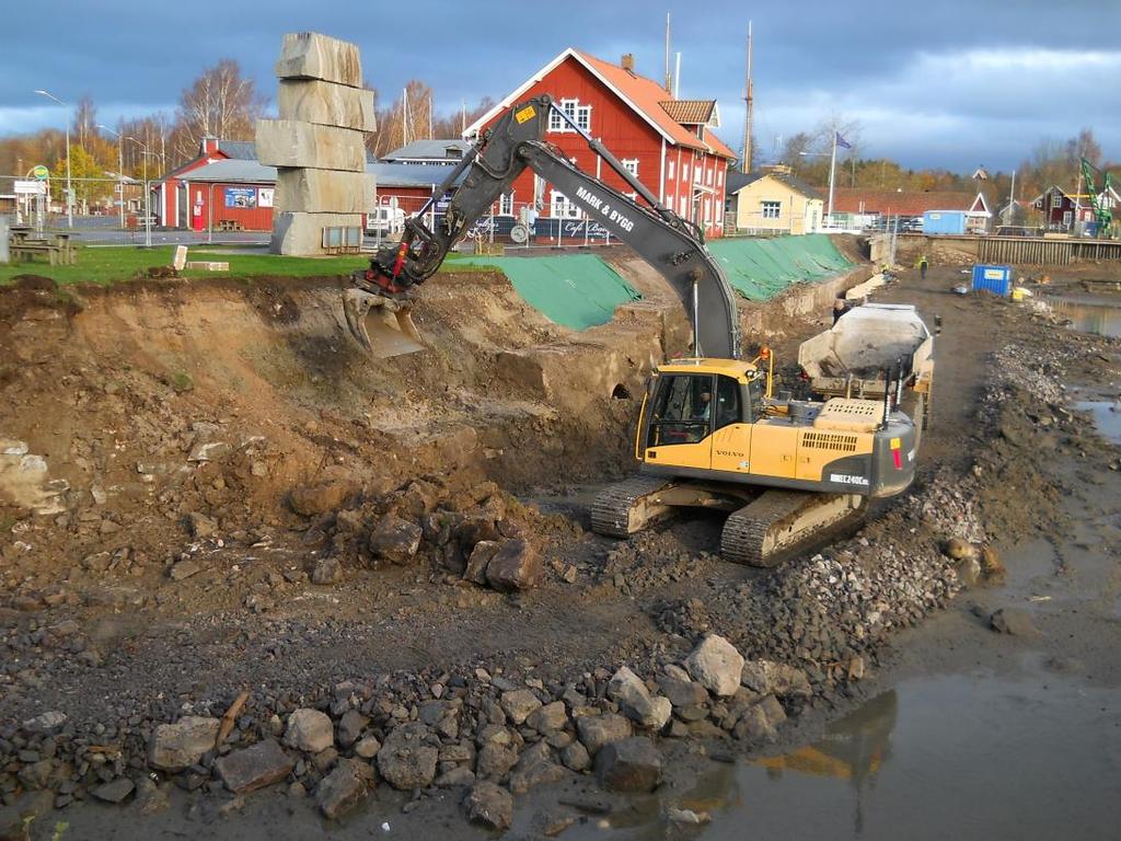 upp och avsluta kajkanten i övre bassängen i Sjötorp.