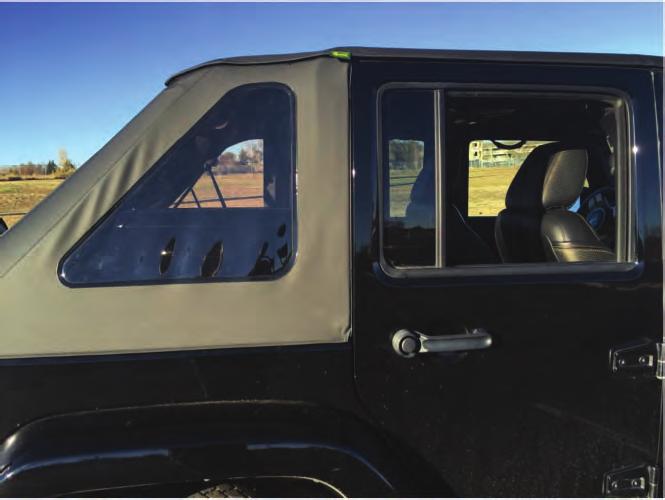 Continue fastening the plastic under the belt rail lip of the Jeep body until the top is fully attached all around the back corners.