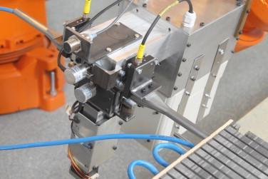 1.2.6 Framtida automatiserad statorlindning För den automatiserade lindningslösningen som utvecklas vid Uppsala universitet är det tänkt att fyra industrirobotar ska användas.