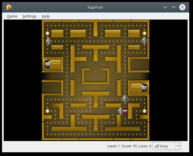Kapitel 1 Inledning SPELTYP: Spelhall ANTAL MÖJLIGA SPELARE: En Kapman är en klon av det välkända spelet Pac-Man. Du måste ta dig igenom nivåerna och undkomma spöken i en labyrint.
