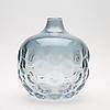 Svagt blått glas med små inneslutna blåsor samt reliefdekor. Signerad Sven Palmqvist och märkt Orrefors Expo nr 402, 1966, höjd 24 cm.
