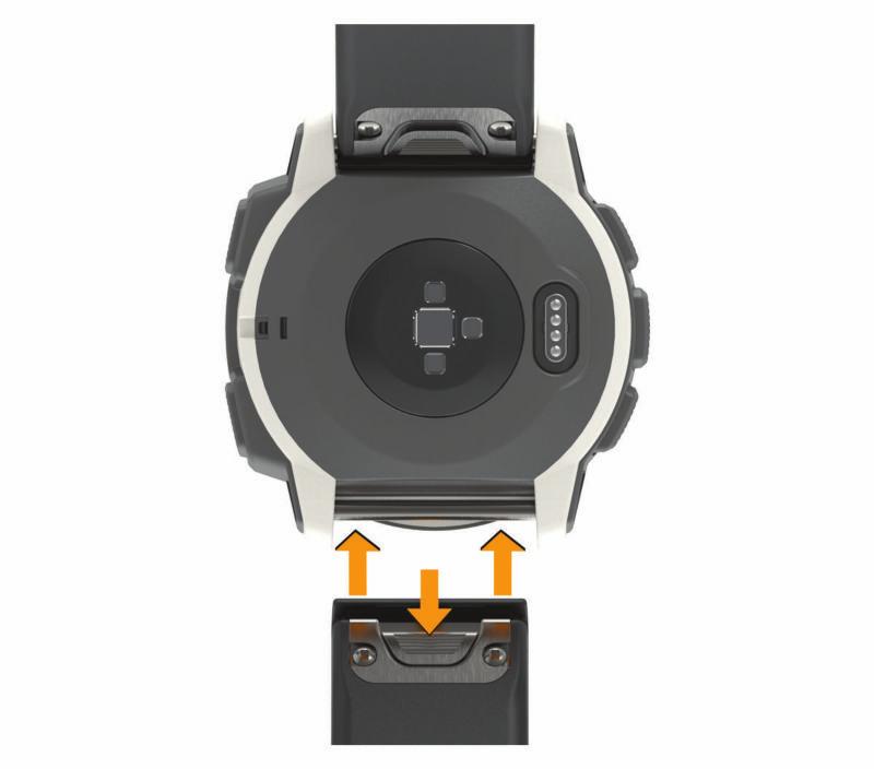 Om du vill installera QuickFit 22 band tar du bort stiftet på klockan från Instinct bandet, sätter på stiftet på enheten och trycker det nya bandet på plats.
