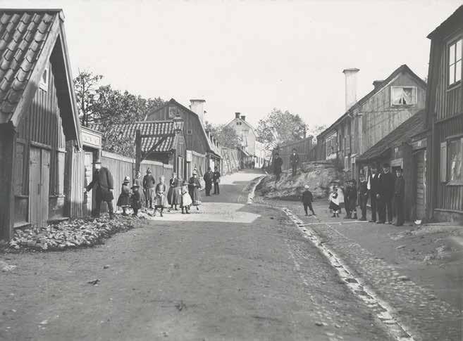STIGBERGSGATAN OMKRING 1890-TALET. TILL VÄNSTER I BILD SYNS NUMMER 19 MED DÖRRAR UT MOT GATAN. FOTO: K. E. STENQUIST.