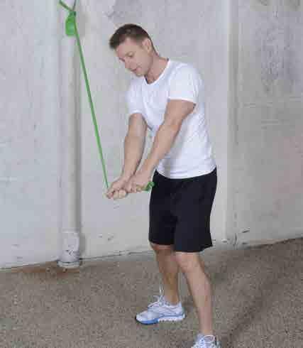 1 2 Eng: Golf swing Trains shoulders, back and torso as well as hip muscles. 1. Attach the rubber band to a fixed object slightly up. Try to simulate a golf swing.
