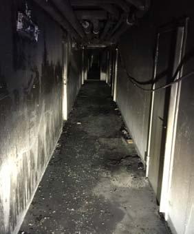 Bild 4. Källargången efter branden. Bild 5. Utrymme där branden startat.