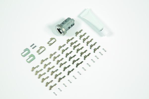 ljusgrå nylon. Ytterfack med Honda logo, axelrem och bärhandtag.
