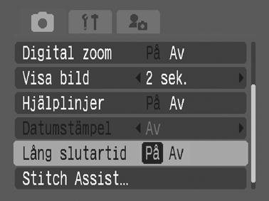 Fotografera med lång slutartid Fotograferingsmetod Du kan ange en lång slutartid om du vill att mörkare motiv ska se ljusare ut. 1 Menyn (Lagring) [Lång slutartid] [På].