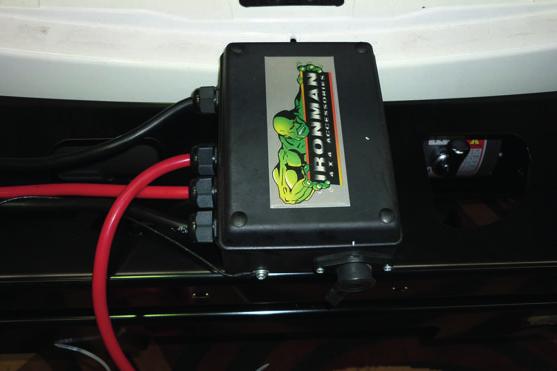 Run the positive and negative battery cables into the engine bay taking care to secure cables away from any sharp or