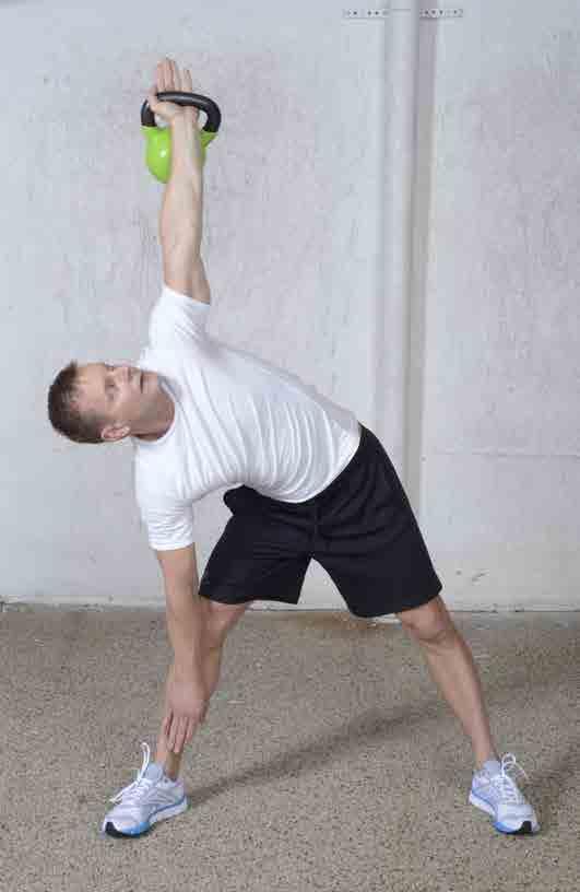 1 2 Eng: Windmill Trains stabilising muscles in the shoulders and torso. 1. Grasp your kettlebell with straight, outstretched arm as in the illustration.