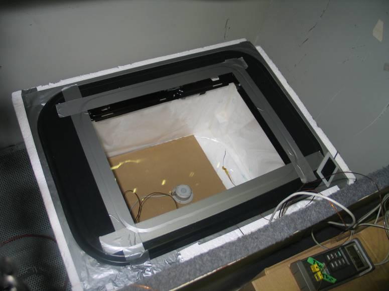 of 365 K the irradiance produced by the lamps was about 1000 W/m 2 at the height of the test pane. The box and measurement equipment are presented in figure 15.