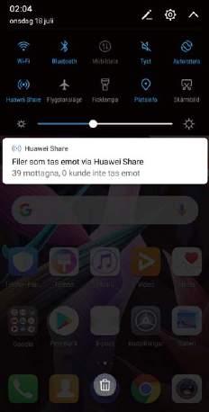 Använda Huawei Share för att ta emot filer: Svep nedåt från statusfältet för att öppna meddelandepanelen och peka sedan på för att aktivera Huawei Share.