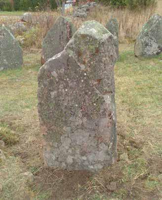 FIG. 8 varefter tomrummet fylldes upp med grus.
