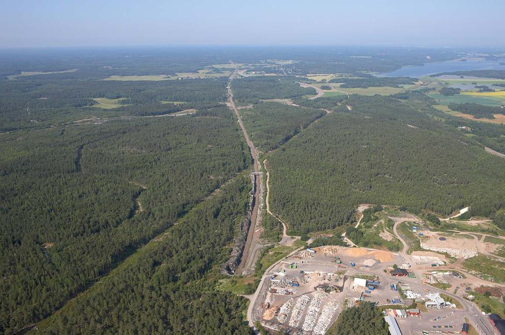 4 Vy västerut från västra tunnelmynningen mot Härad.