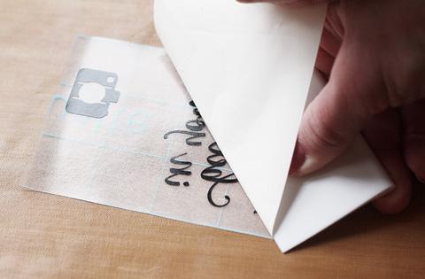 After weeding, use transfer tape to pick up the top layer first, including the