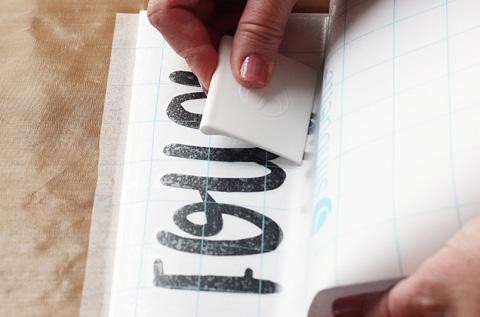 Transfer tape hinge method On a larger design where you are more concerned about getting it perfectly straight, you may choose to use the hinge method with transfer tape.