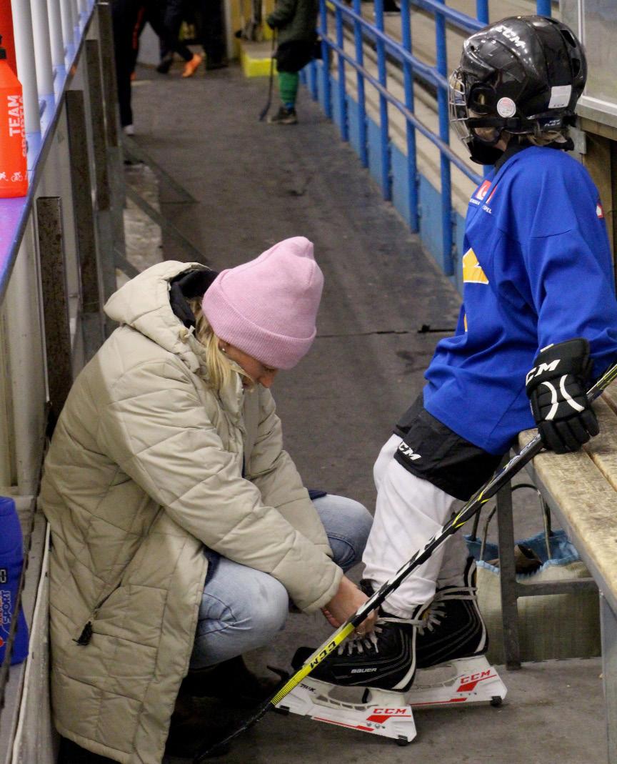 en pyramid med en bred bas av barn och ungdomar och en spetsig topp som utgör elitidrotten till att se idrottsrörelsen som formen av en rektangel