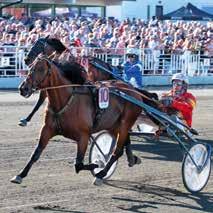 Full Account) segrade på nya världsrekordet 1.09,8a/1640m. Guldstoet Axevallas treåringslopp för ston, Guldstoet, vanns av A Sweet Dance (e. Maharajah Sugar Step e. Sugarcane Hanover).