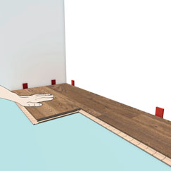 Vid läggning av golv med Woodloc -fog, underlättar det om läggningen startar vid den långsida som har flest dörrar. Om dörrar finns vid kortsidorna i rummet börja varje brädrad vid dessa.