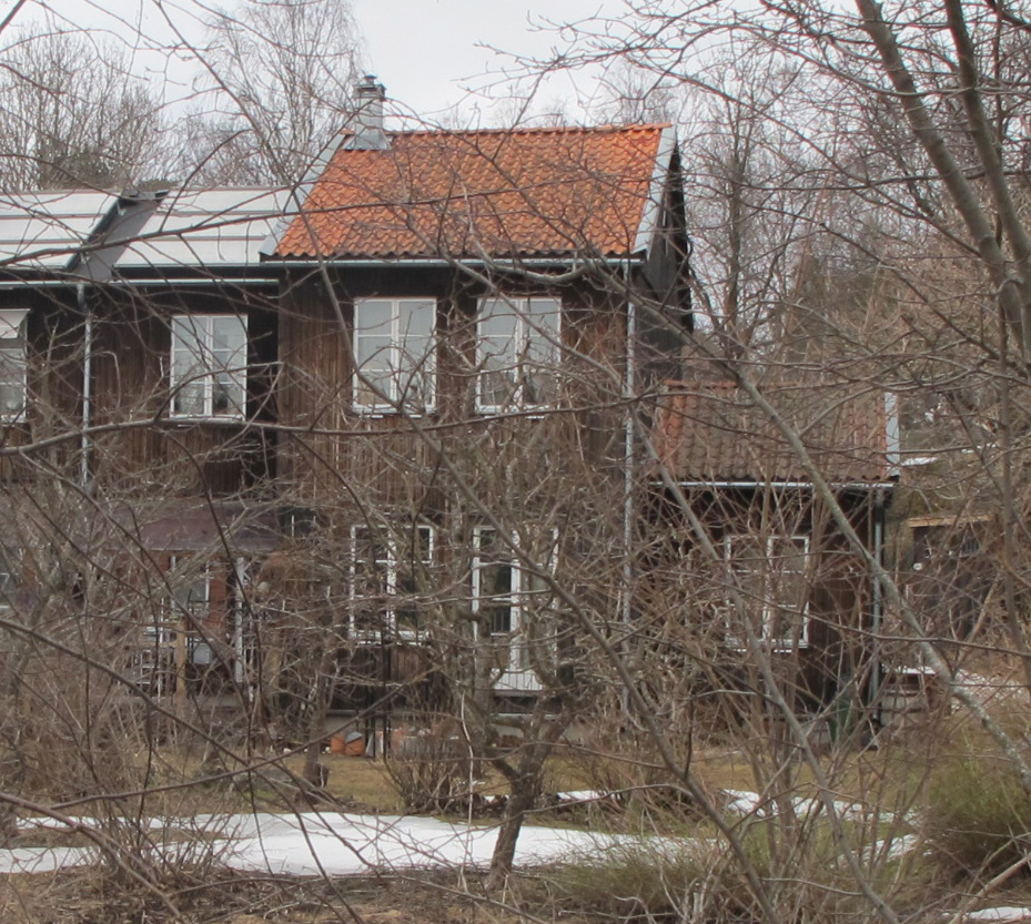 Satellitbild över Västra Hamnen Flagghusen Urbana Villor Flerfamiljshusets fasad mot gatan. Gruppens process pågick från 2003 till 2008.