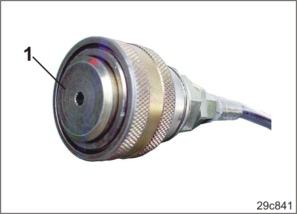 Töm hydraulackumulatorn (Bild 55/1) innan hydrauluttaget (Bild 57) kopplas från. 1.1 Aktivera ventilen (Bild 56/1). Då töms hydraulackumulatorn.