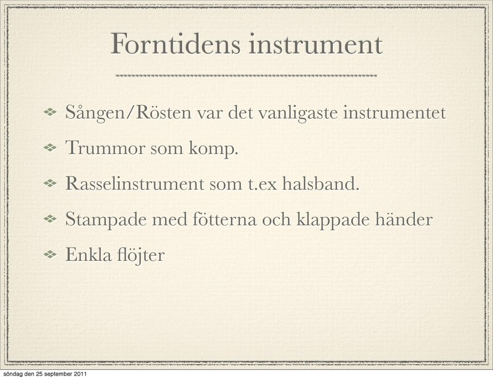 Rasselinstrument som t.ex halsband.